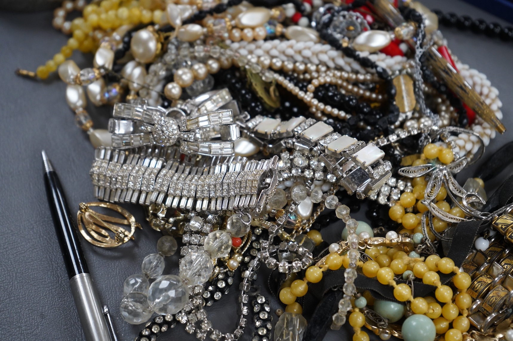 A large quantity of assorted costume jewellery.